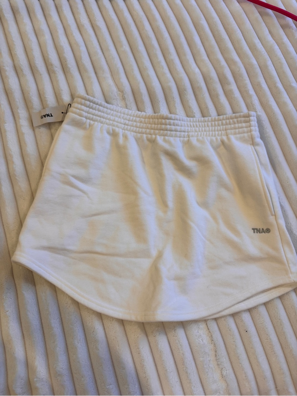 Aritzia TNA white mini skirt